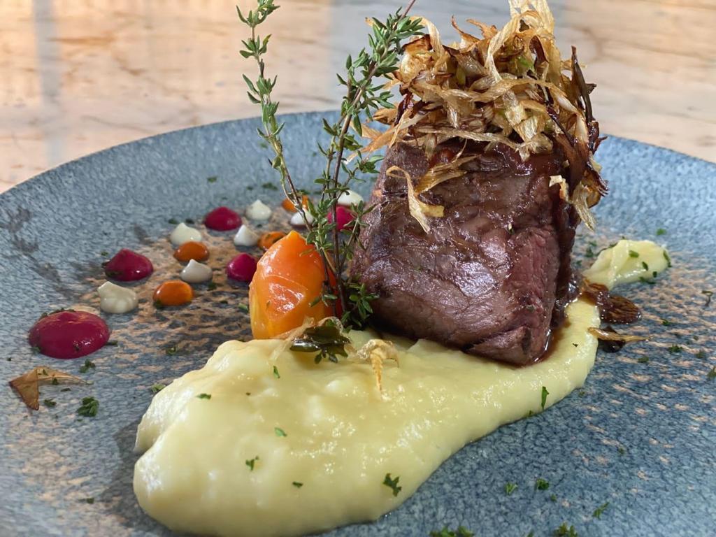 Beef fillet served with seasonal vegetables
